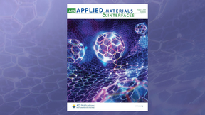 ACS journal cover of [60]fullerene monoadduct physisorbed on a graphene network