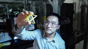 Engineer Xiaoyu "Rayne" Zheng studies a macroscale version of the unit cell