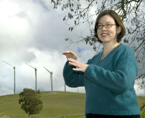  Julie Lundquist with windmills in background